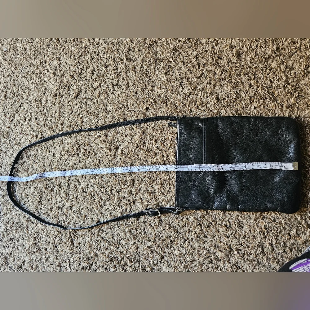 Margot black leather crossbody bag with corner pocket on‎ a front